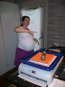 Me chatting while my YUDU screen is burning. With book and weight on top to hold the cover down. Per the YUDU instructions.