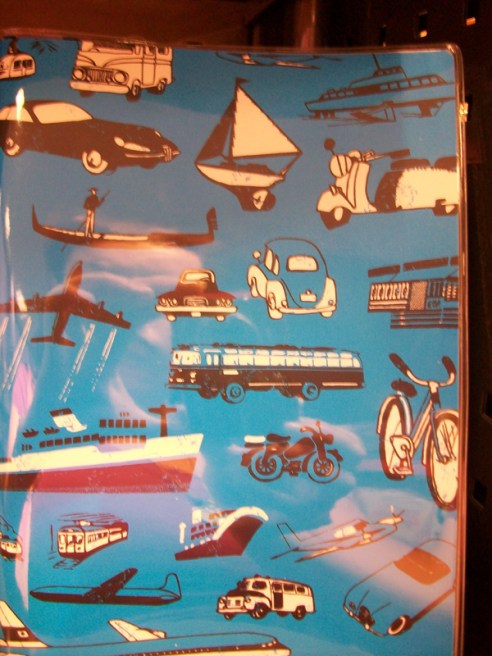 A travel journal with vehicles in the pattern