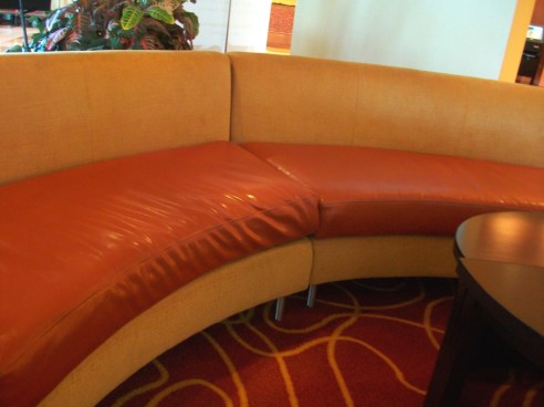 Two shades of orange couch