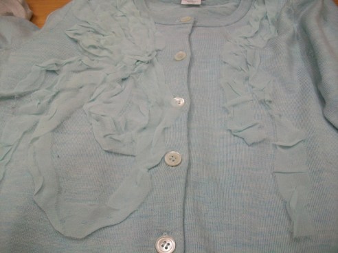 soft fabric scrunched on a sweater - so sweet