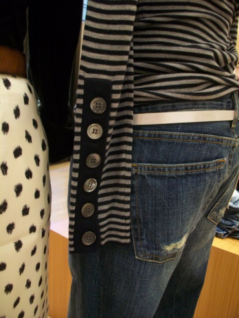 buttons on the sleeve of a long sleeve tee