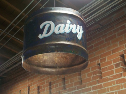 Old barrels re-used for secton signage